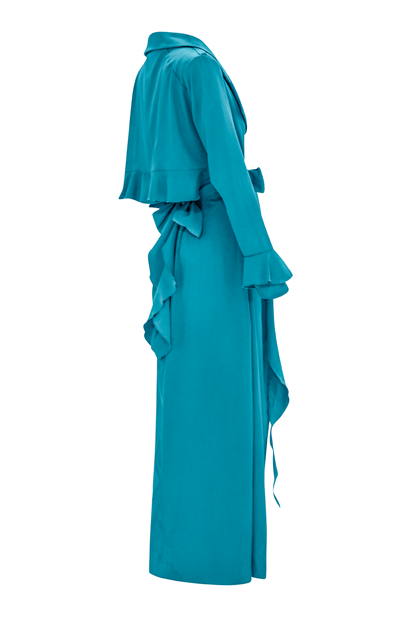 Unveil timeless elegance with our Turquoise Cascade Belted Trench Coat, meticulously designed for sophistication and style. Featuring a cascading back flap and hand-painted cotton lining, this coat exudes luxury and high-end fashion appeal.